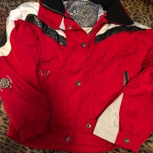 SPYDER RED AND BLACK SKI JACKET KIDS SIZE 12, fold up hood